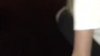 Girl in white jumping off second story 