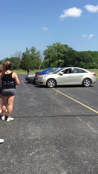 Extremely Talented Tumblers Flip Over Three Vehicles