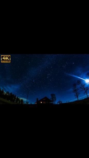 Breathtaking mountain cabin time lapse of night sky