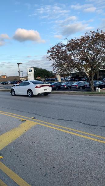 Man Jumps on Hood to Avoid Hit and Run