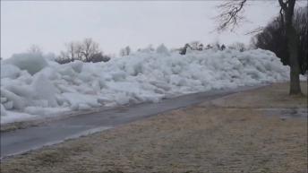 High winds create frozen tsunami!!