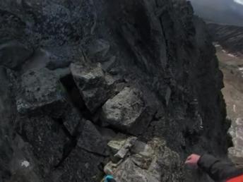 Fearless Daredevil Scales Narrow Mountain Cliff To Reach Summit