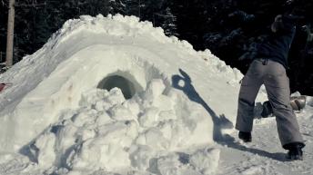 How to build a snow cave in three minutes