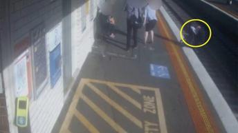 Horrifying moment tiny baby thrown onto train tracks after pram drifts off platform