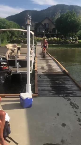 Dad Jumping BMX Bike into Lake Fails