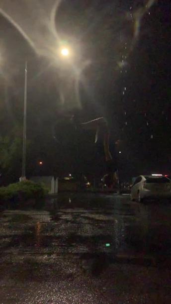 Landing a Backflip as the Lightning Strikes
