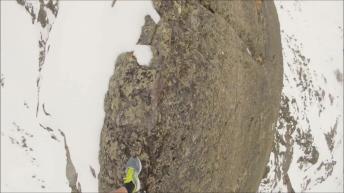 Daredevil risks life climbing mountain peak